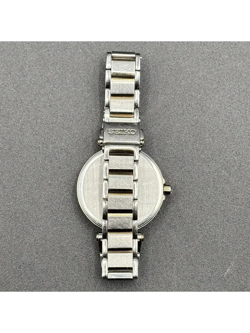 Seiko Solar Two-Tone Silver Dial Roman Numeral Ladies 32mm Watch SUT154P1